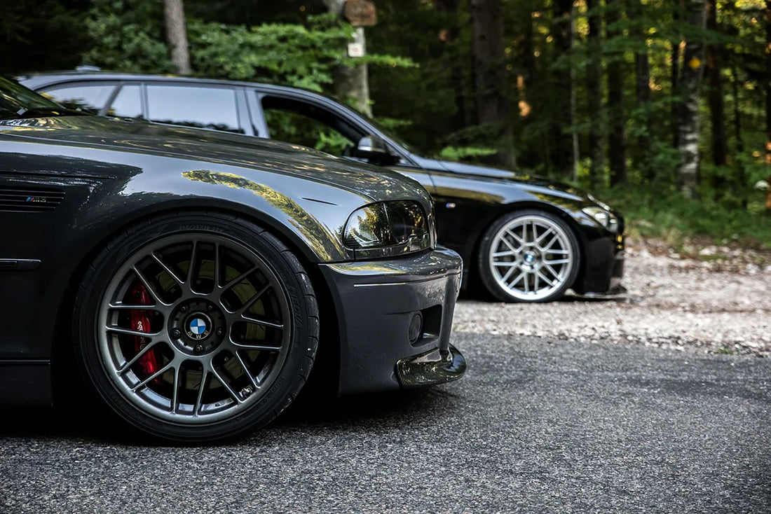 Two BMWs with wheel spacers installed
