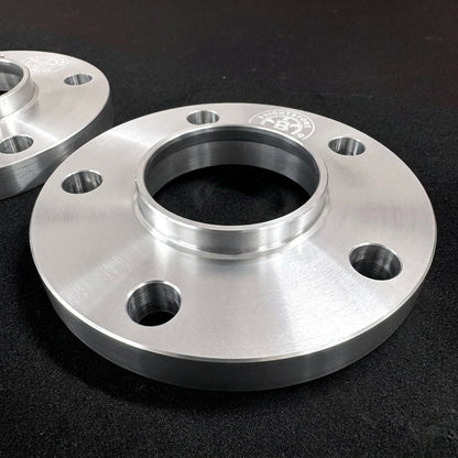 Second angle of a Brightstone Engineering wheel spacer showing the machined bore and bolt clearance holes