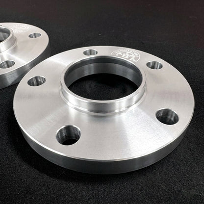 Second angle of a Brightstone Engineering wheel spacer showing the machined bore and bolt clearance holes